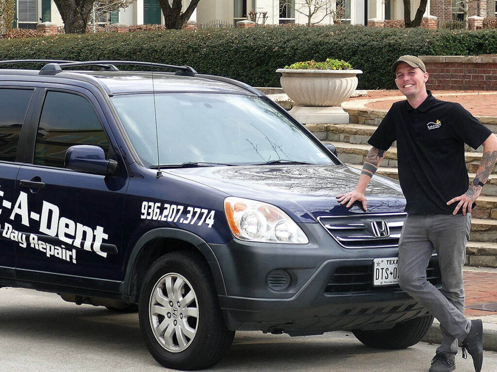 A Just-A-Dent technician at work